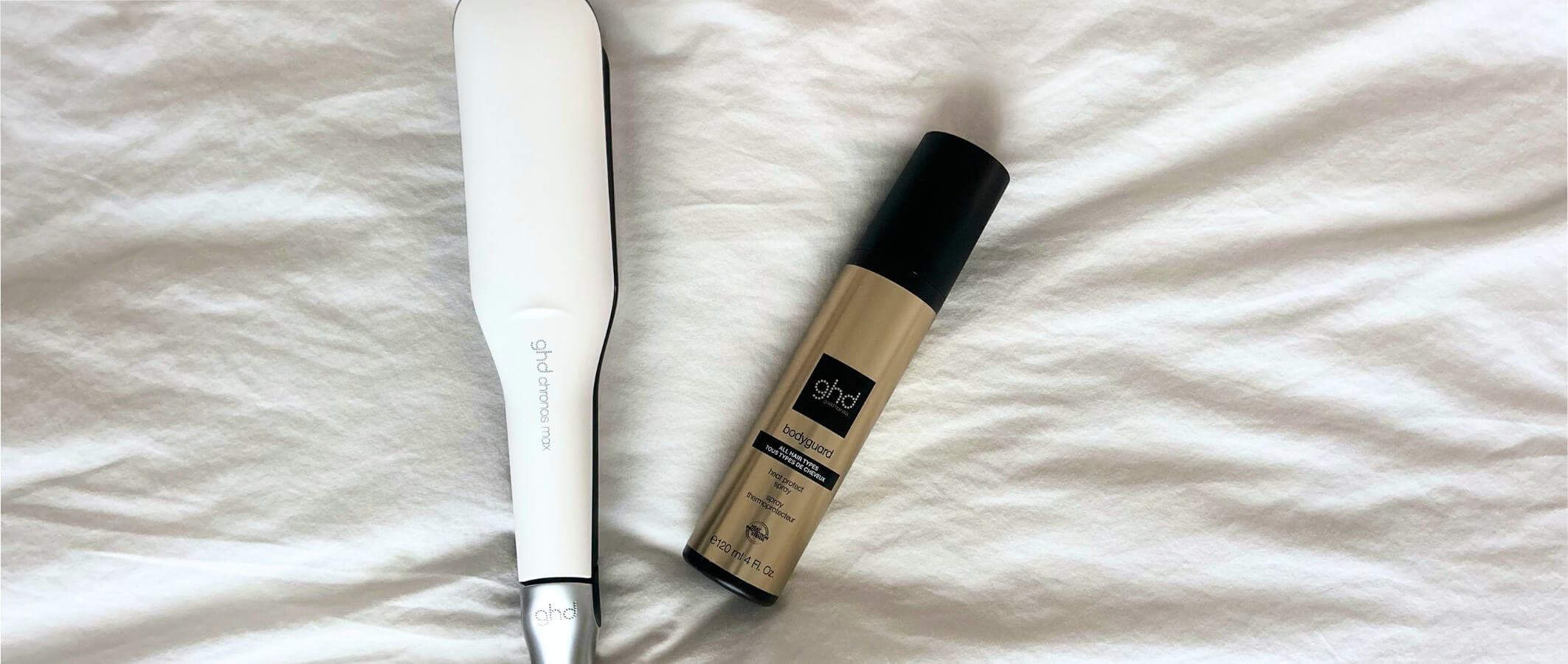 weisses haarglaetteisen chronos max und hitzeschutzspray prep bodyguard auf weissem hintergrund